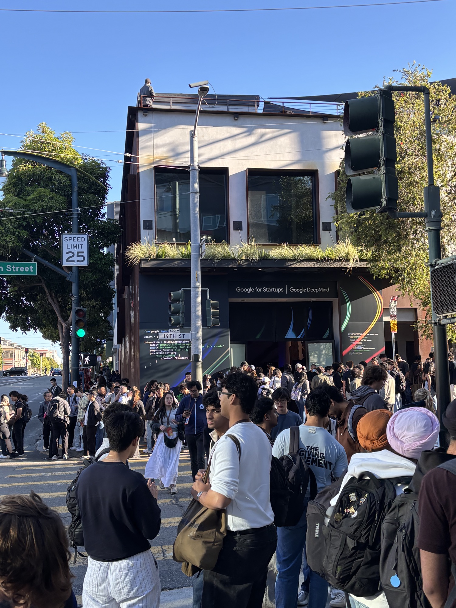 a crowd outside the Google for Startups and Google DeepMind afterparty building on 19th Street